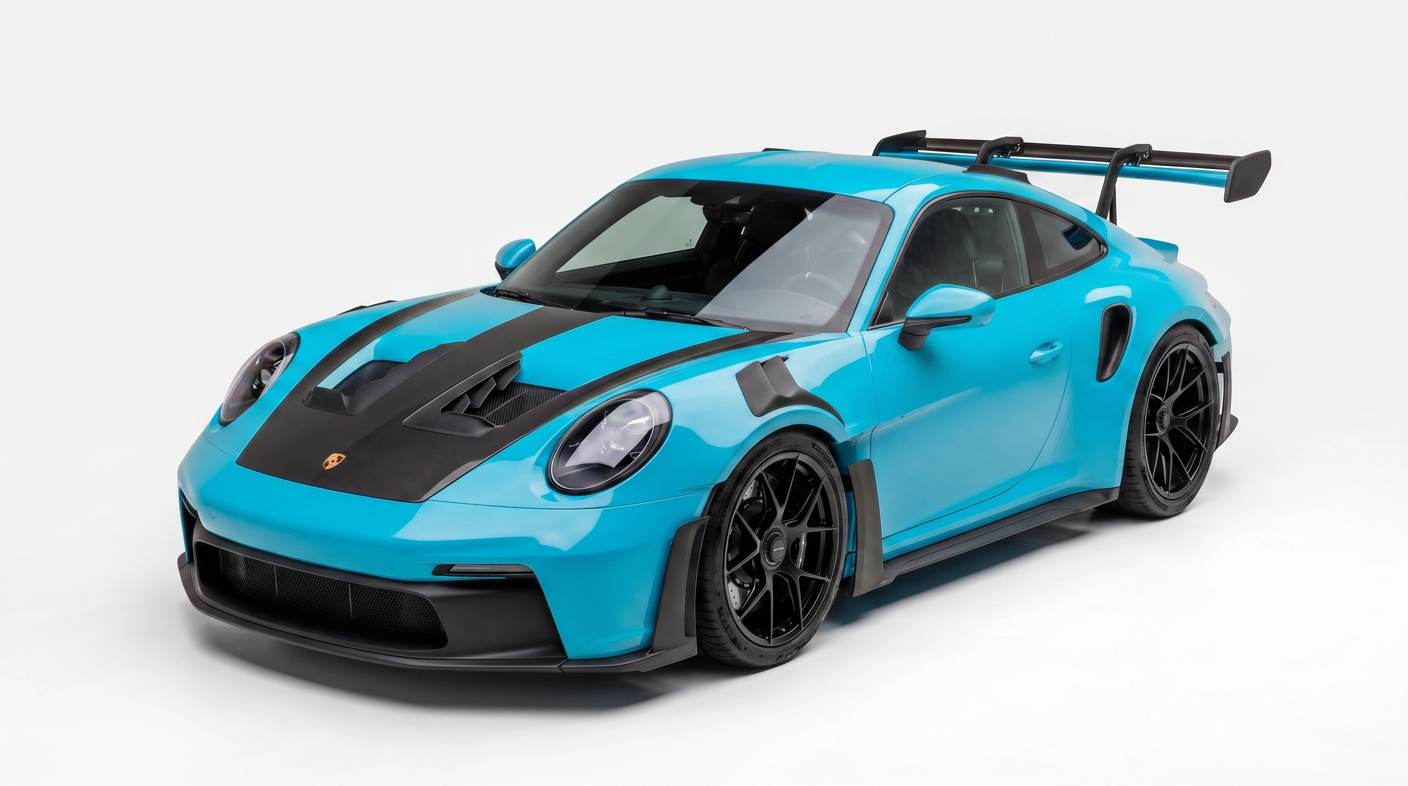 Sports car before any Essential Three Package stage is shown